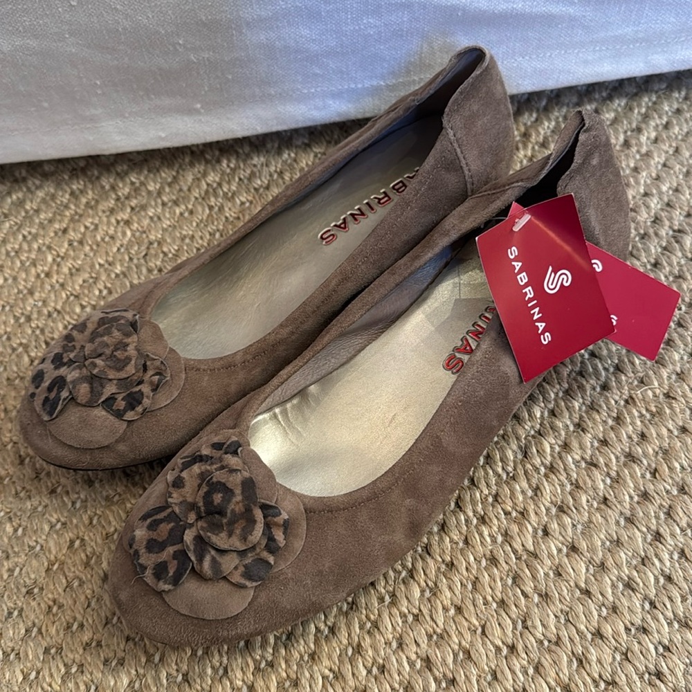 Sabrina’s size 38 new with tags suede comfort flats. Flower and leopard detail